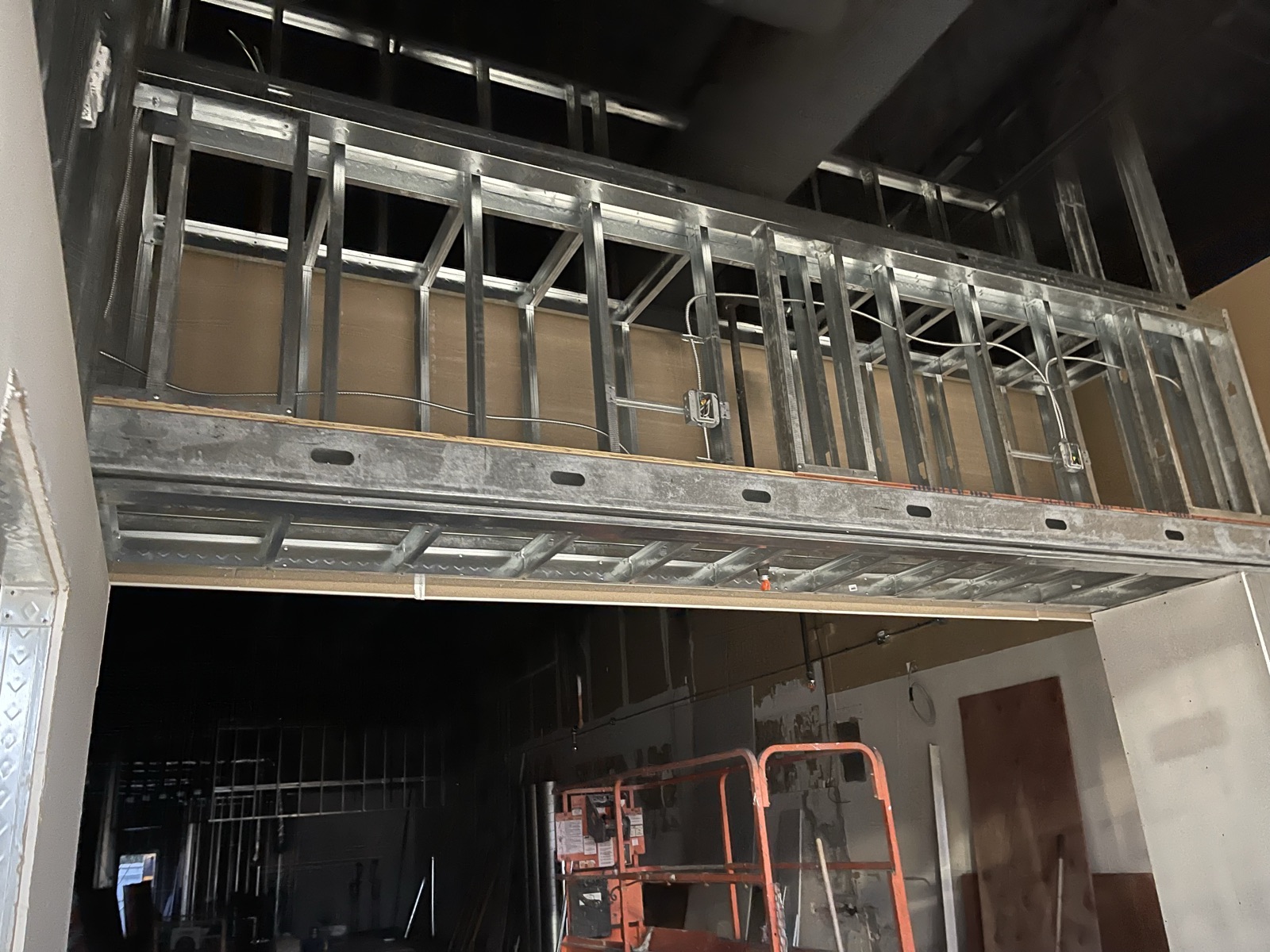 Mezzanine framing over the opening